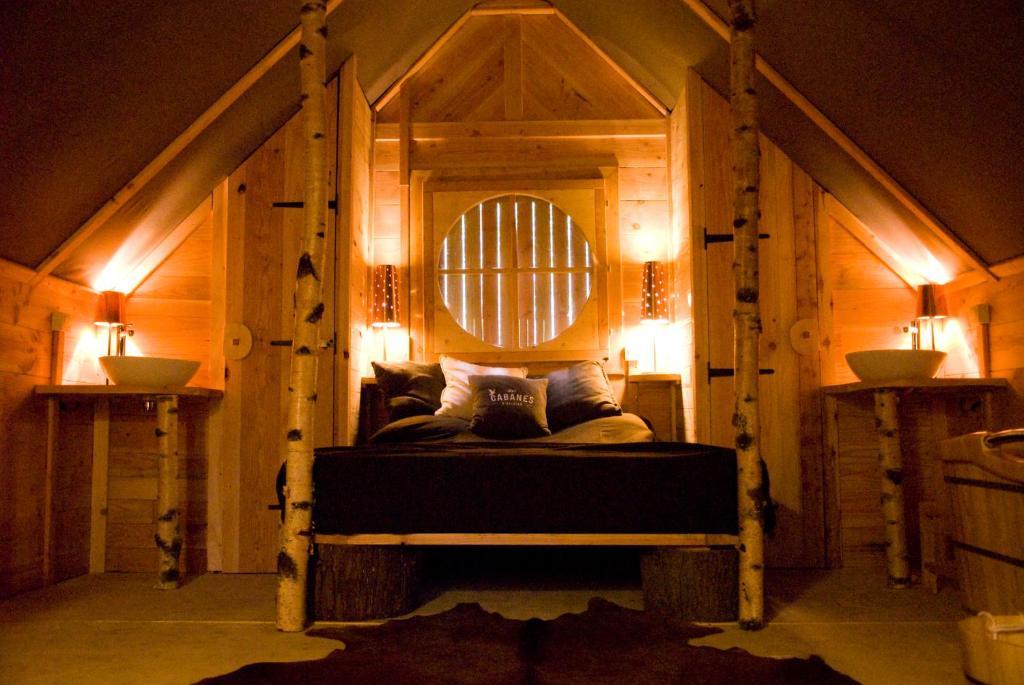 Cabane Lodge Domaine Du Lac Chambon Мурол Стая снимка
